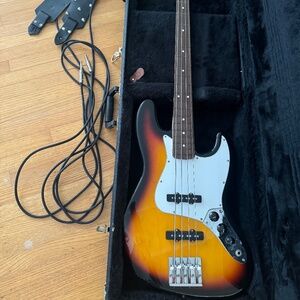 Gorgeous new condition Fender Jazz Bass Guitar sunburst black guitars instrument